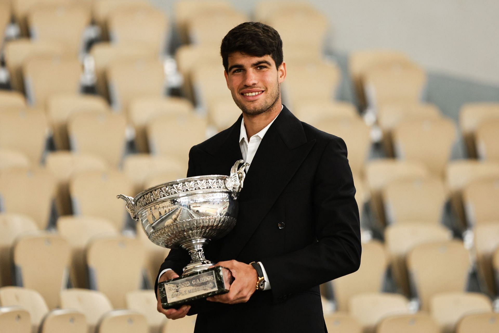 Carlos Alcaraz poses won his first French Open title last year | Image Source: Getty